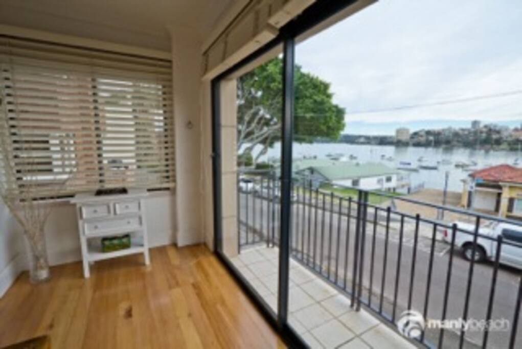 Sunny balcony with views to watch the ferries and life.