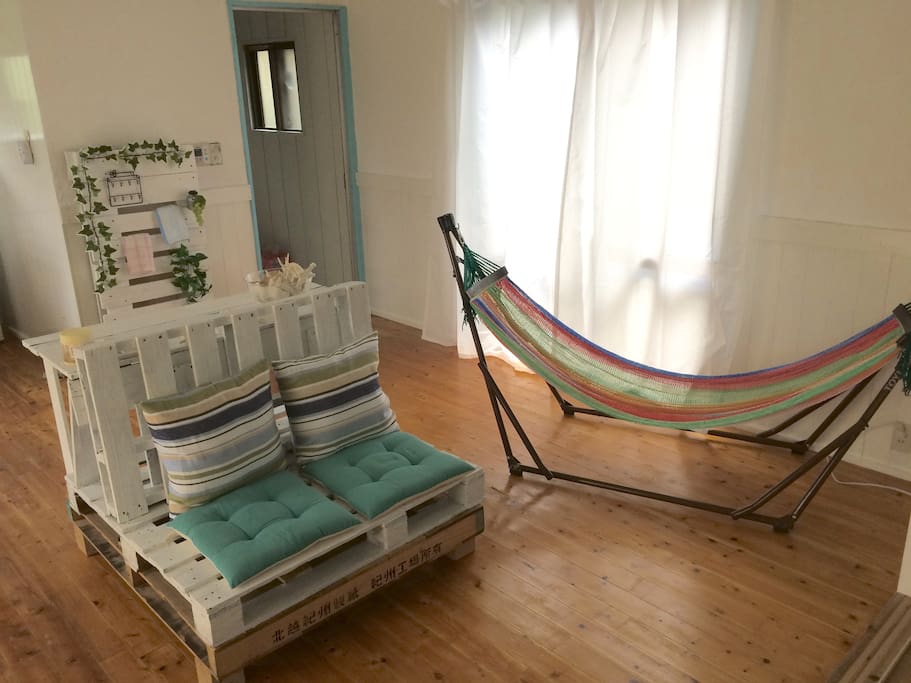 Homemade furniture out of wooden pallets to add to the mood, and of course a hammock for max de-tensioning!