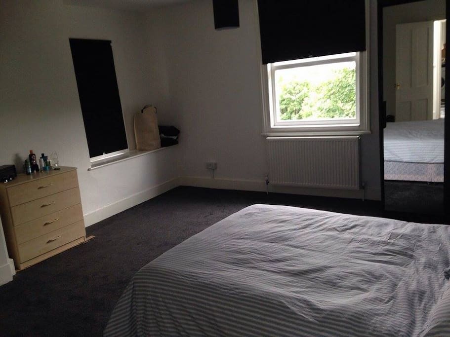 larger bedroom with doublebed , 2 wardrobes and a closet