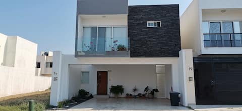 Home minutes from the beach with pool access