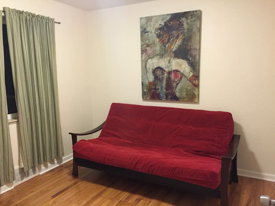 Very comfortable futon - sleeps 2 smaller people.