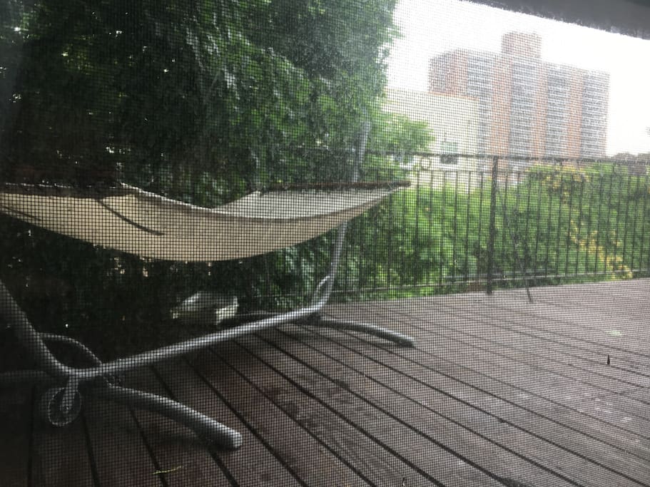 The deck where you can enjoy a relaxing swing on a hammock and a great view.