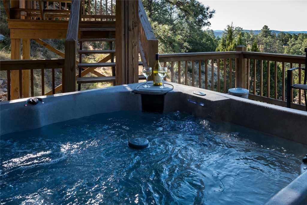 Soothing Waters - Imagine ending each day in the hot tub while you celebrate another perfect day on your vacation. After a long e