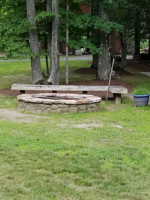 Fire Pit with firewood for your use.