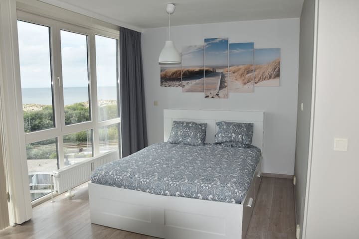 Lit double avec vue sur mer