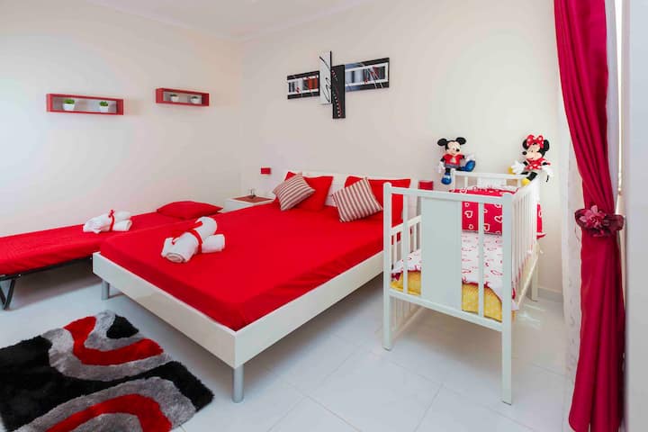 Spare Bedroom with  King bed, folded bed and baby bed