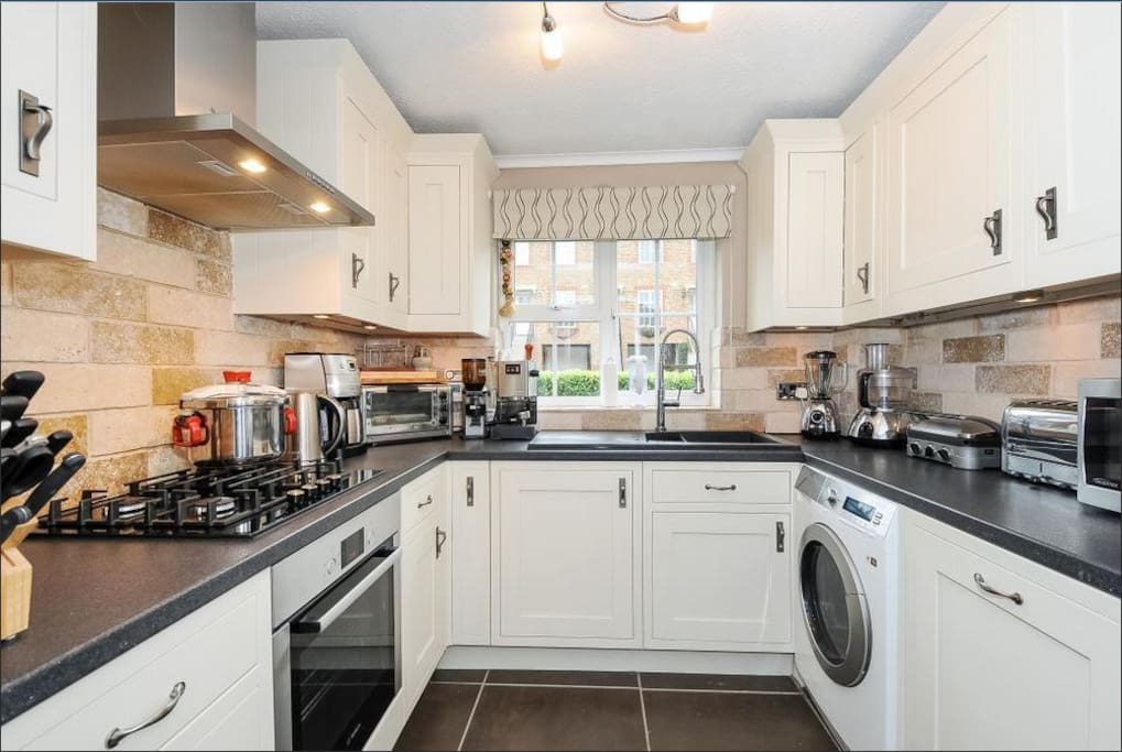 The fully fitted kitchen features all Bosch integrated appliances, dishwasher, washing machine & upright Samsung fridge freezer.
