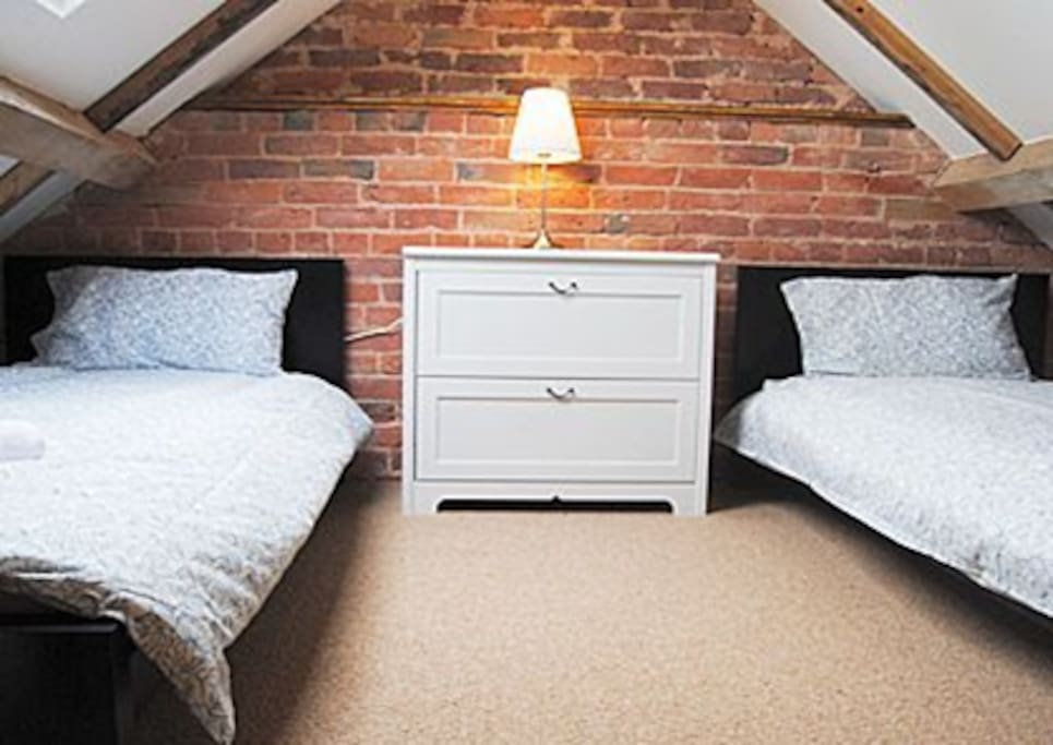 two single beds on the mezzanine