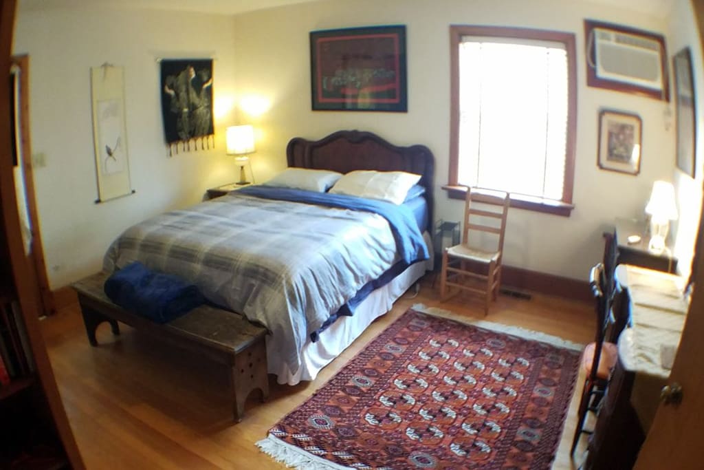Fisheye lens photo of back bedroom