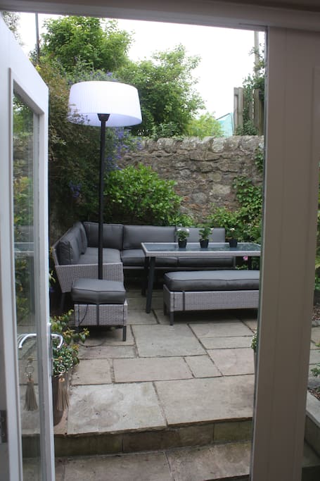 Enjoy dining alfresco in the garden with heater and BBQ