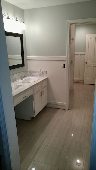 Each guest has their own vanity area, the toilet and shower are shared (all doors lock)