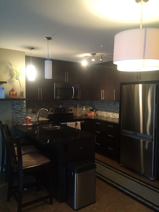 Prepare meals on granite counter tops. Help yourself to cereal and fruit