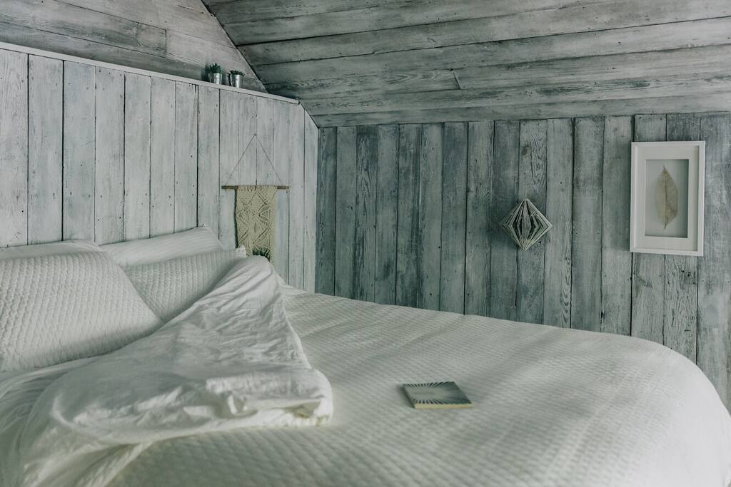 Queen bed with luxury Tuft & Needle mattress and plush down alternative hypoallergenic topper...it's a dream