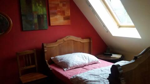 Cozy attic room overlooking orchard