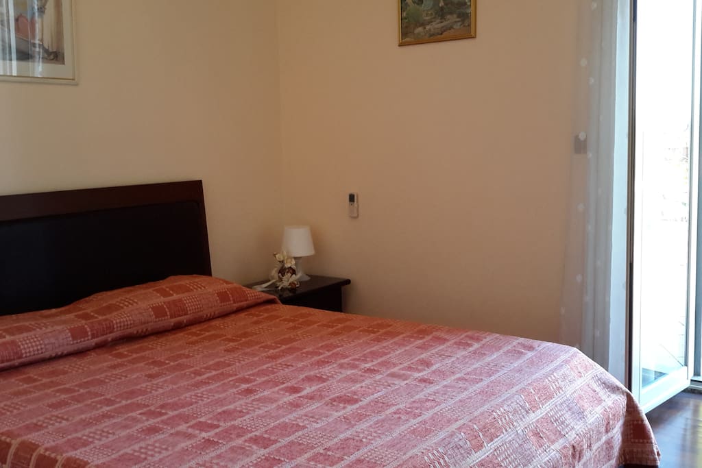 the bedroom that leads to the terrace