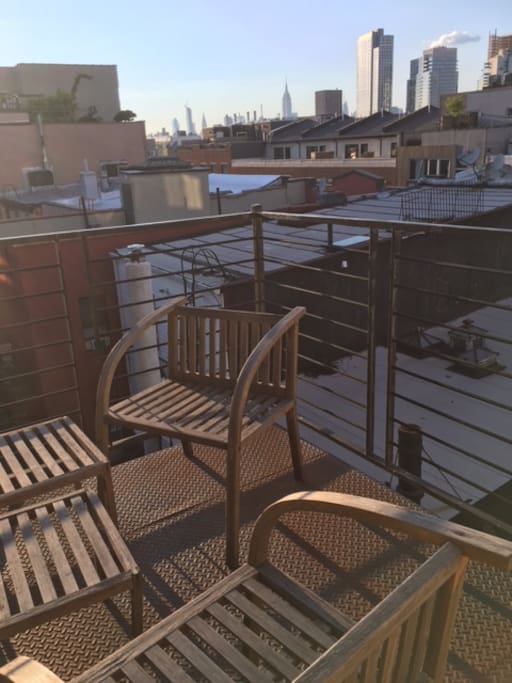 Apartment private balcony with a grill, garden, and gorgeous views of Manhattan