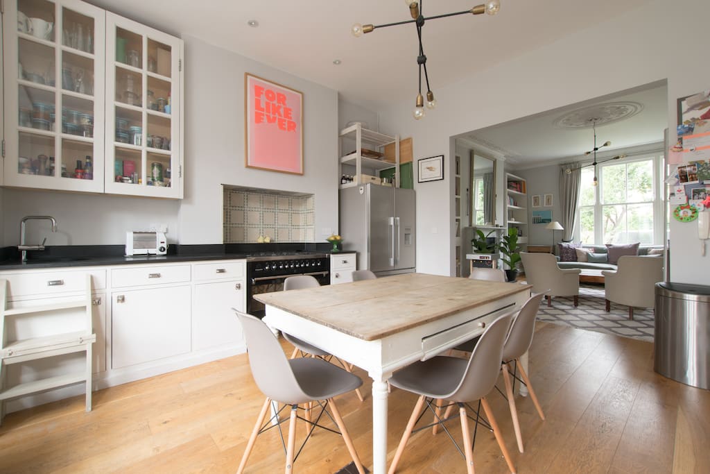 The open-plan design of the ground floor shows off the kitchen and sitting room.