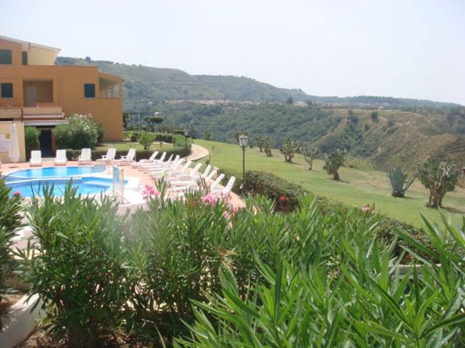 Surrounded by lush gardens, the pool provides visitors an oasis of tranquility.