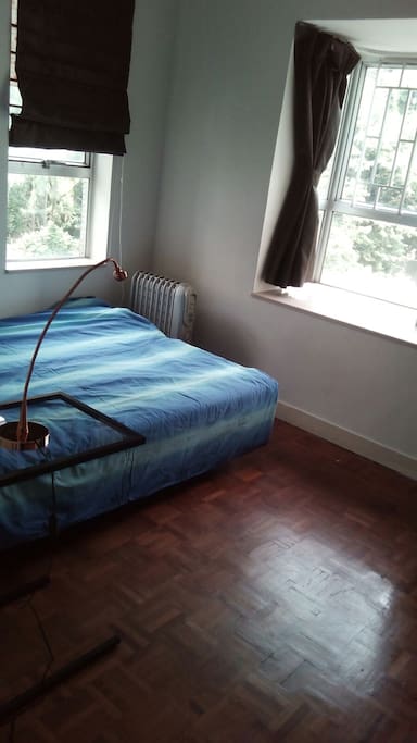 Bedroom with full green view