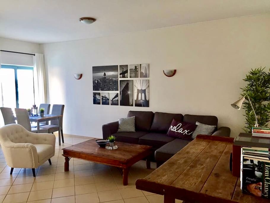 Living and dining area (couch can pull out to a bed to accommodate 1-2 guests)