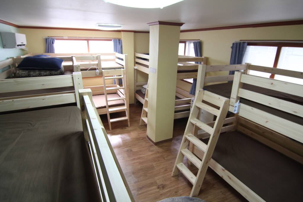 10 bed dormitory room for male with one bathroom.