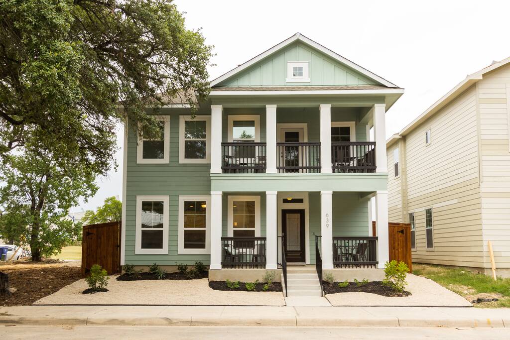 Plenty of outdoor seating on front porch and upstairs balcony