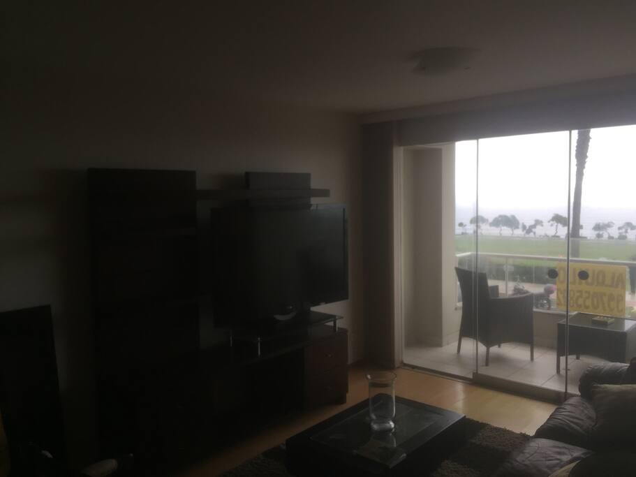 Sala con terraza y vista al mar