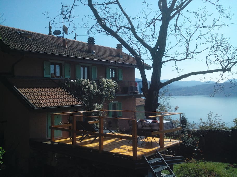the new terrace , the lake and the house
