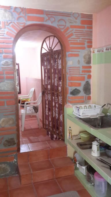 Kitchen looking into bedroom.