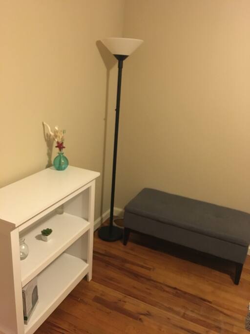 Bookshelf so guests can organize their items. As well as a storage bench.