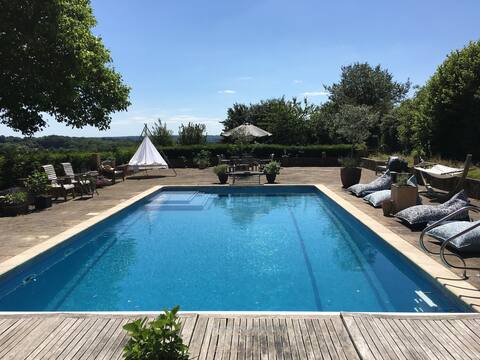 Large heated swimming pool, tennis court and views