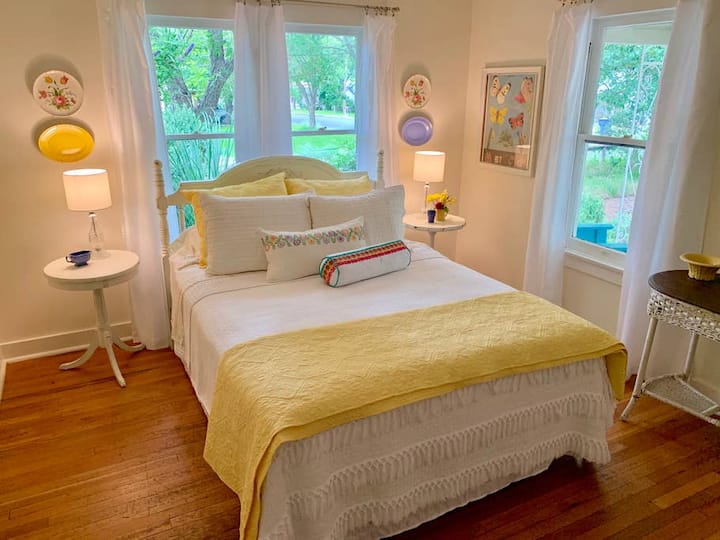 Queen Size Bedroom with views of the front gardens.
