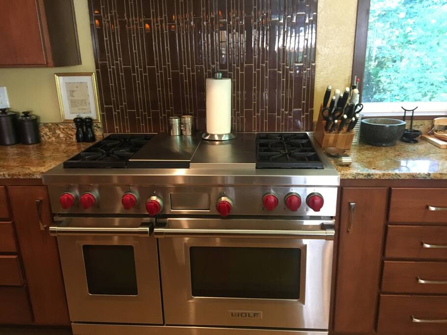 Wolf Oven with 4 burners, griddle, two ovens.