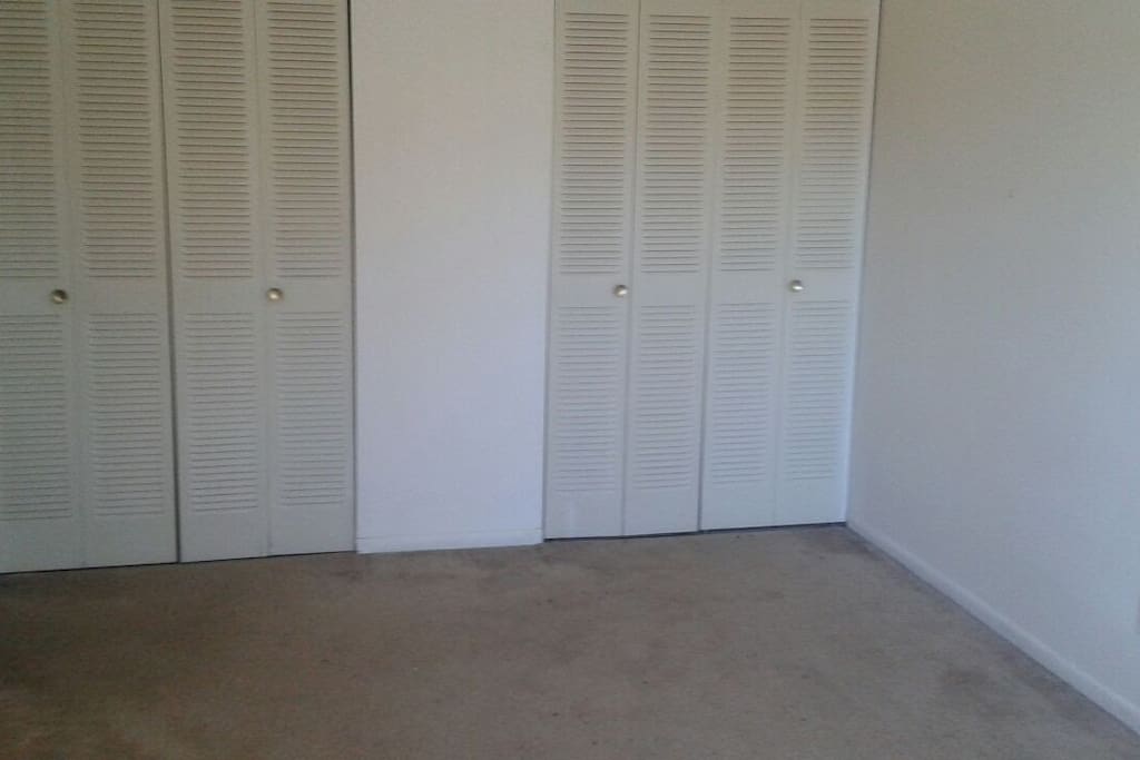 Ample wardrobe space with hangers