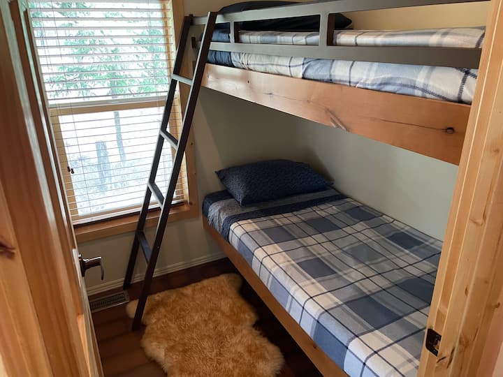 This is the bunk bed room with two beds. They fit a 6’2” adult and are also a favourite with kids.