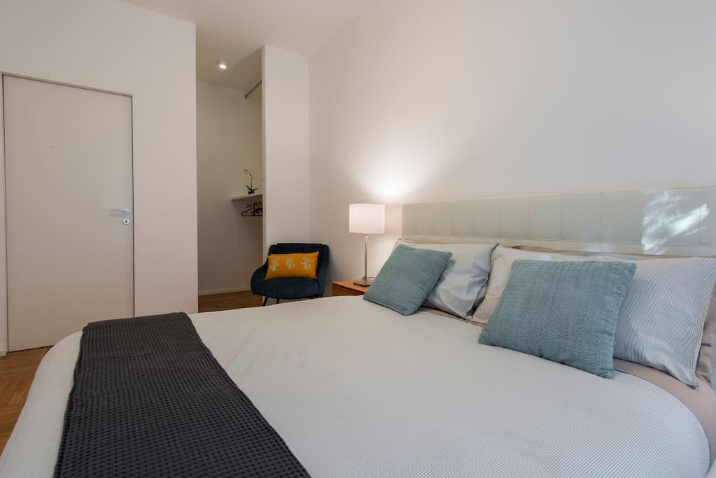 Modern and bright bedroom with cabin wardorbe