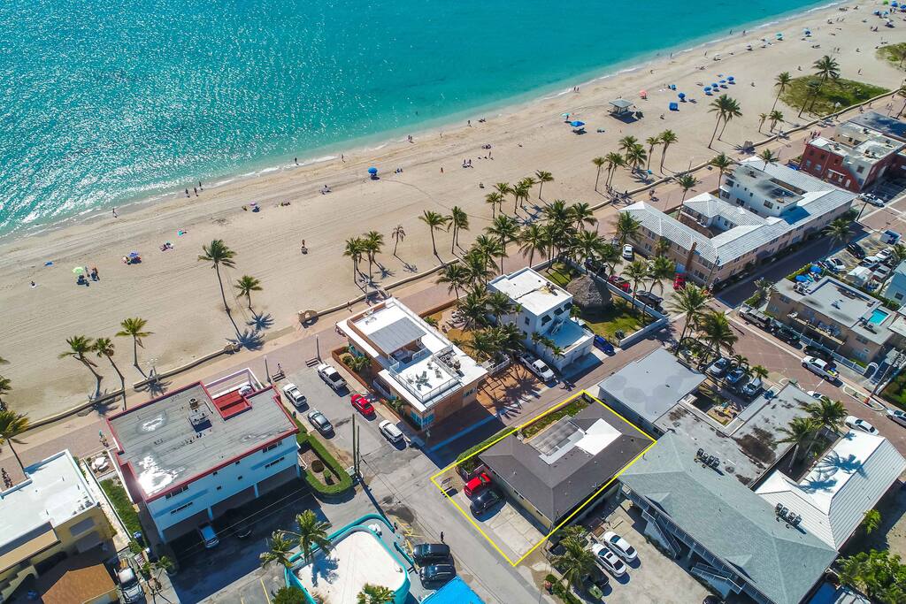 One house away from the sand.