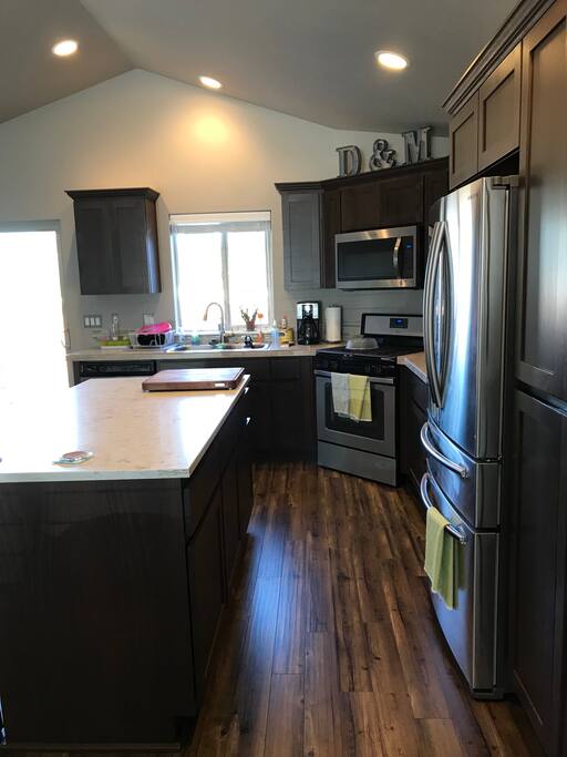 Bright and open kitchen. Enjoy local coffee, yogurt, or cereal in the morning.
