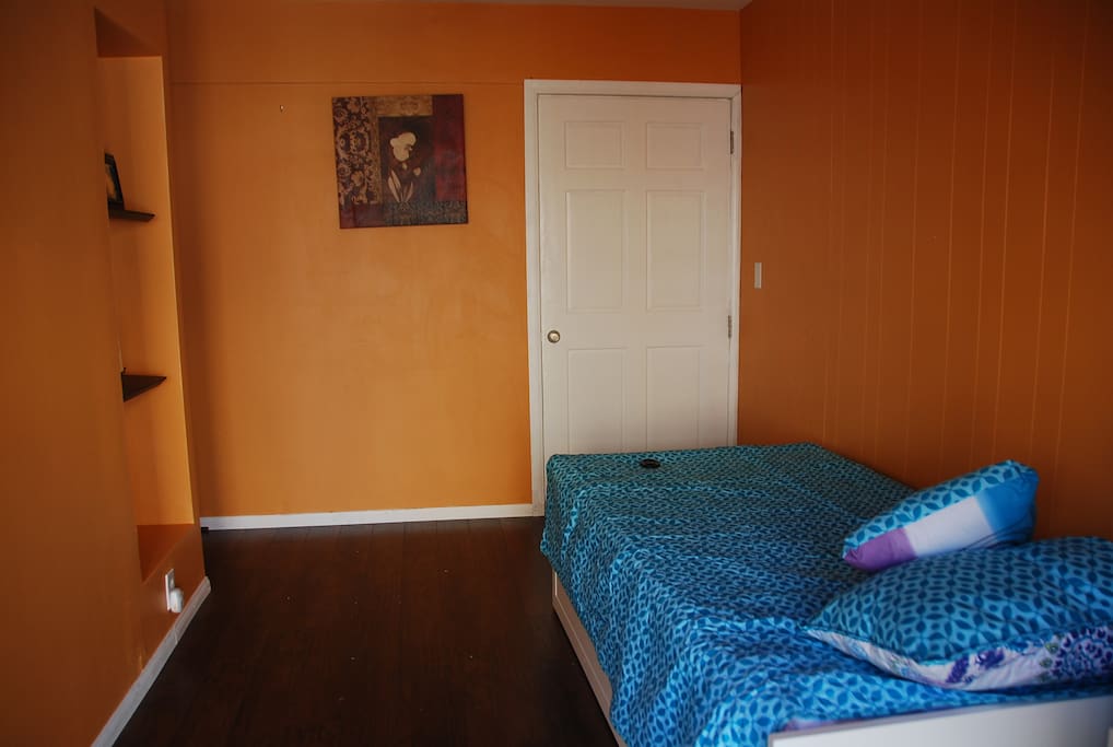 Cozy suite has extra room to move around and access kitchenette area.