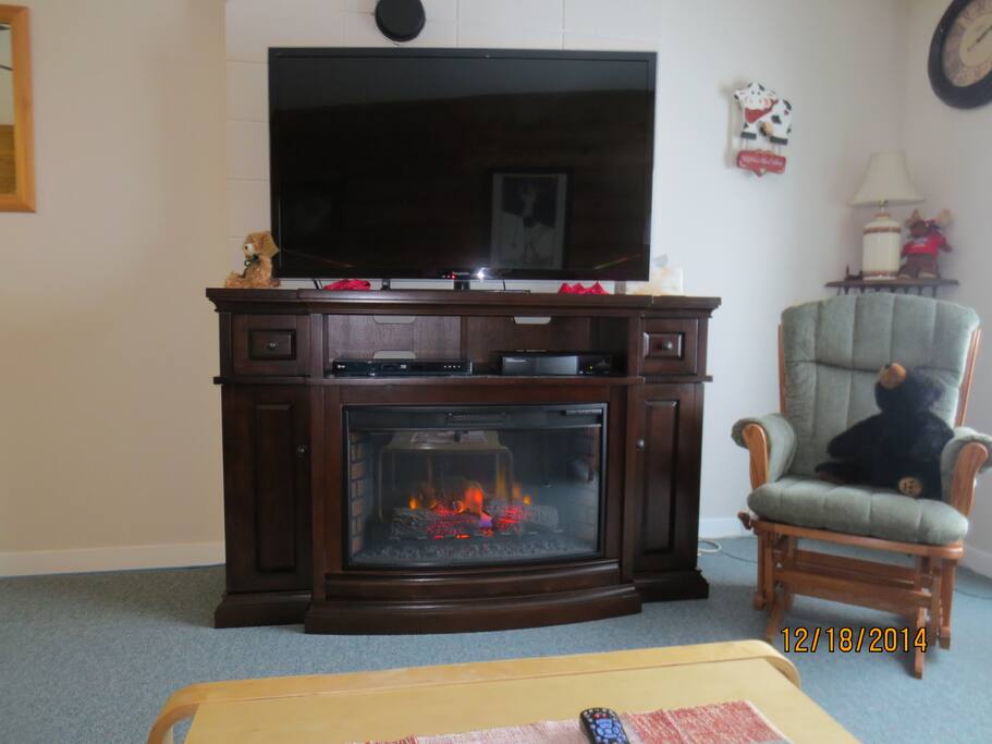 The electric fireplace(cosy) and 55 inch TV