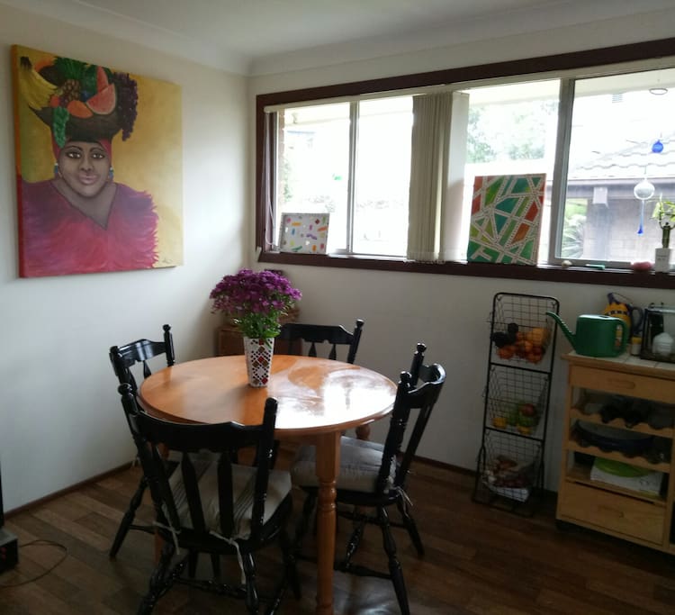 comfortable dining area adjacent to kitchen