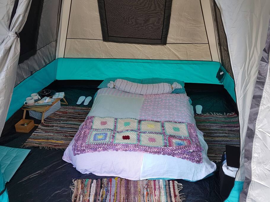 "Glamping" because "Comfy-ping" isn't a word.
