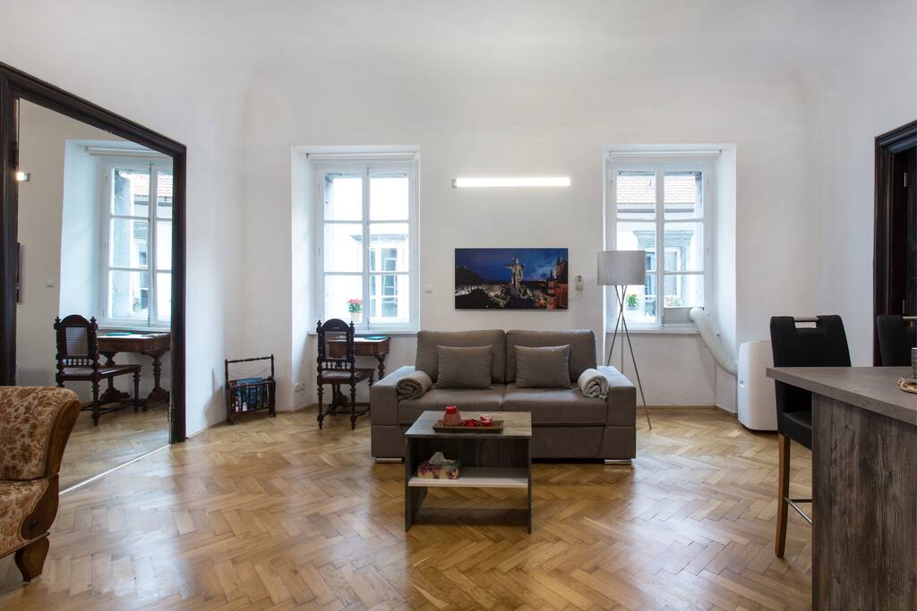 The residence has large windows so that the sunlight is not lacking. However, you can also darken the windows. On the left side is a great old table for laptop with great view on the second oldest street in city.