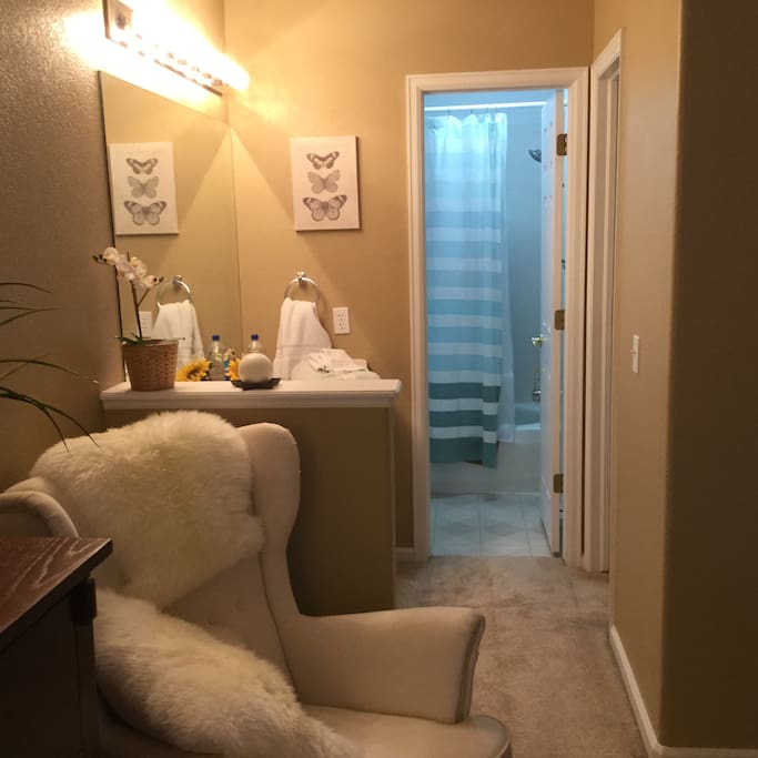 Ensuite room with bathtub and walk in closet