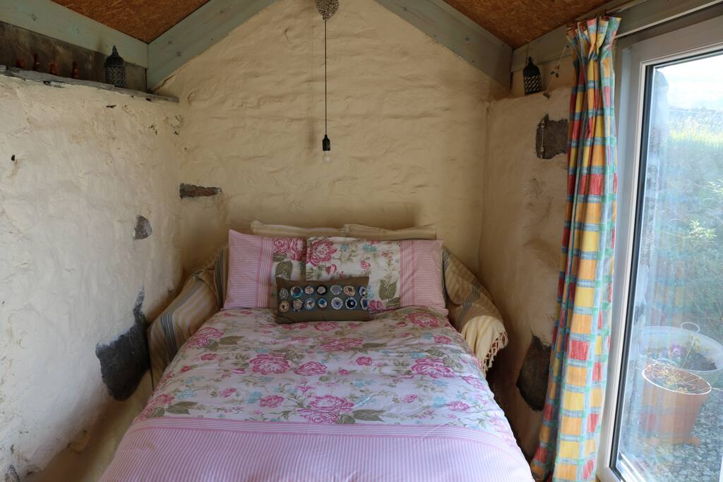 The cosy yet comfortable double bed.