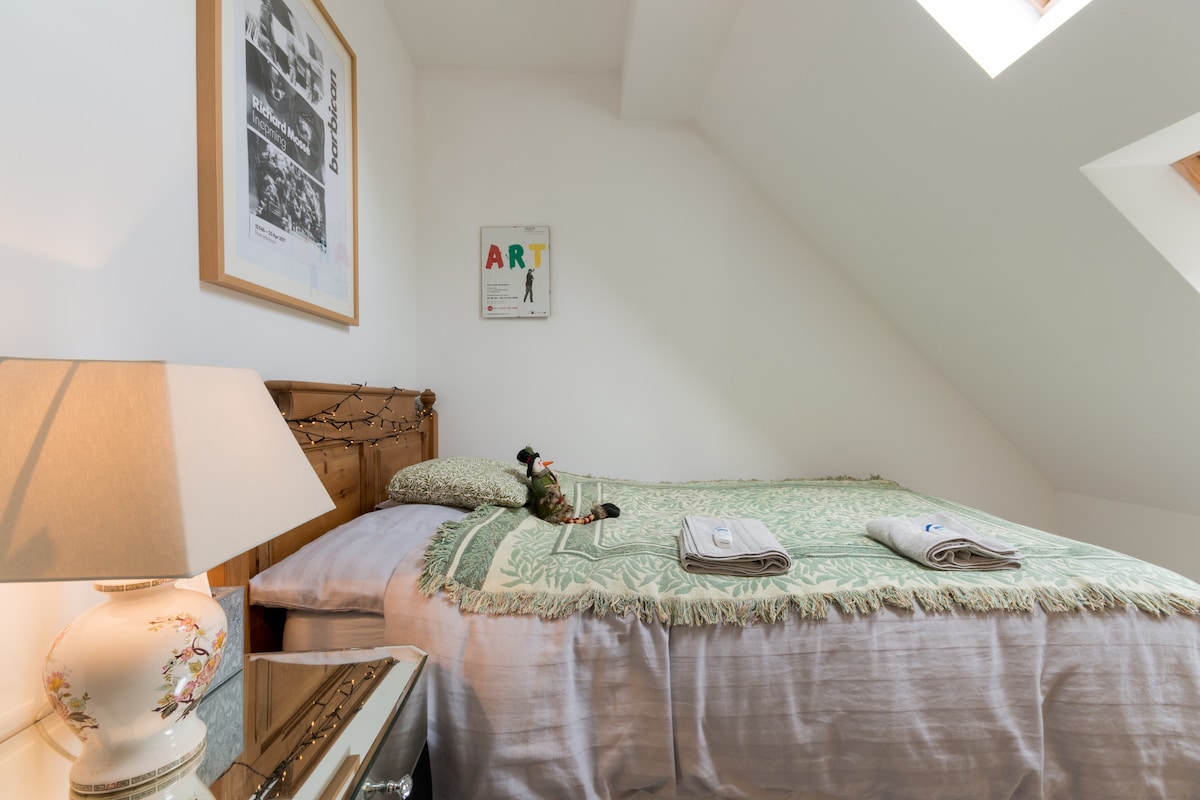 The standard double bed in the bijou bolt hole. An additional single air bed is also available for this room if separate beds are required.  