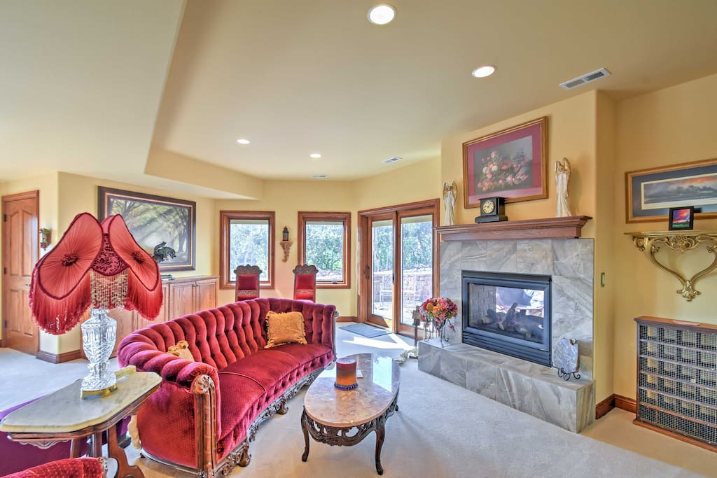 Get cozy on the velvet couch while warming yourself by the gas-burning fireplace.