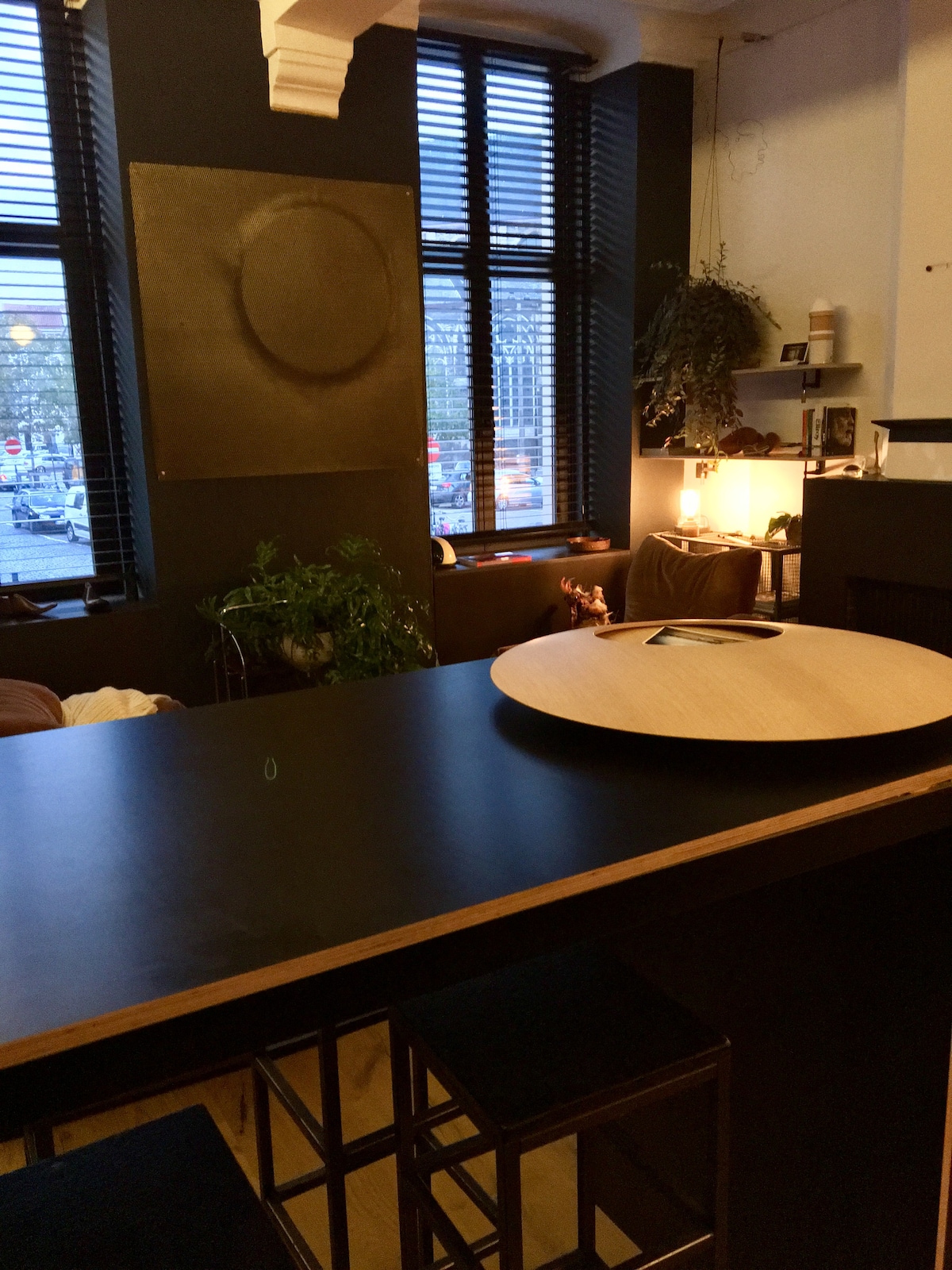 Large dining table by the kitchen at Bed Resort Belfort in Ghent