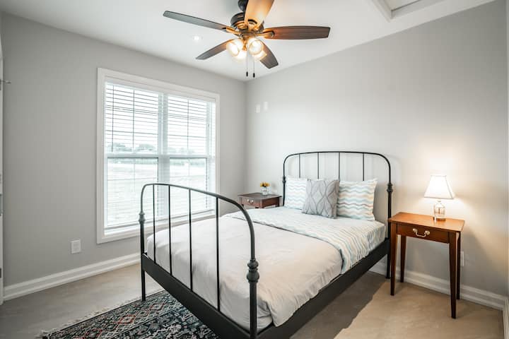 Guest bedroom with queen bed, premium memory foam mattress, clean linens, closet, hangers. 