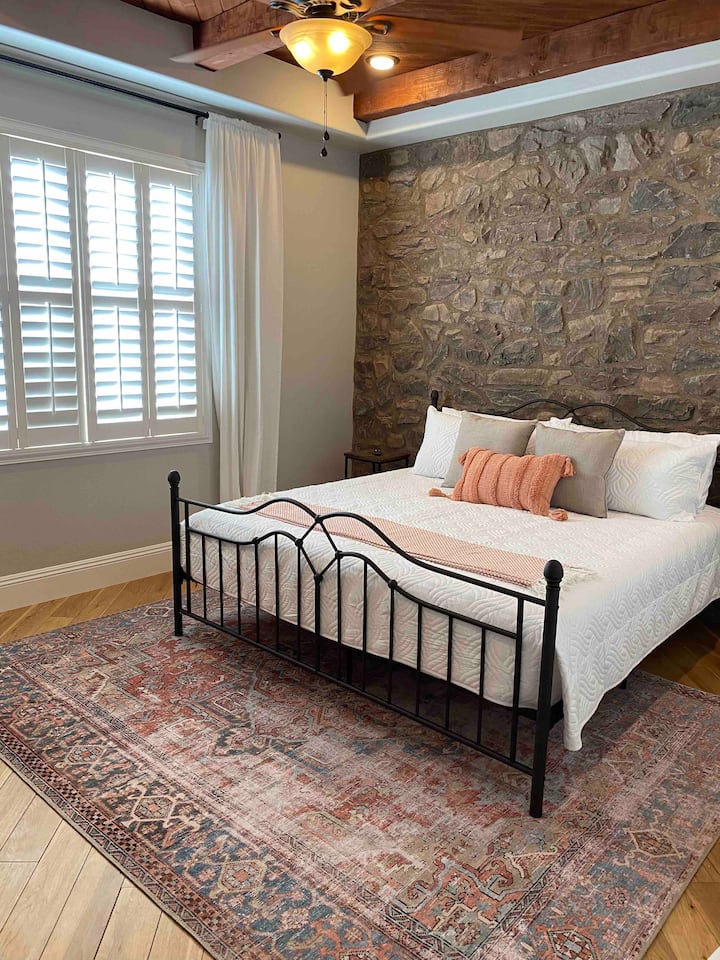 2nd Bedroom.  King sized bed - Ensuite Bath with bath/Shower/Toilet room.  50” TV